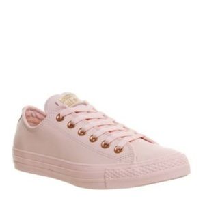 Pink and gold low top converse